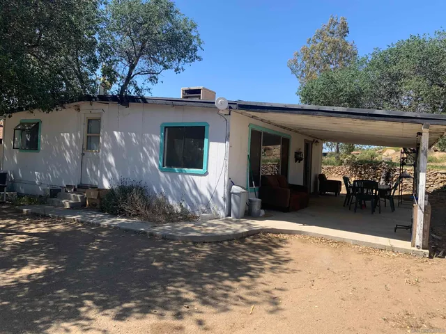 a view of a house with patio