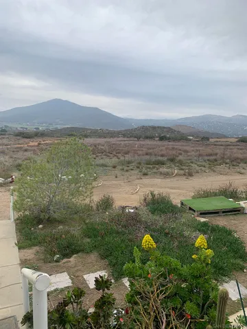 a view of lake with mountain