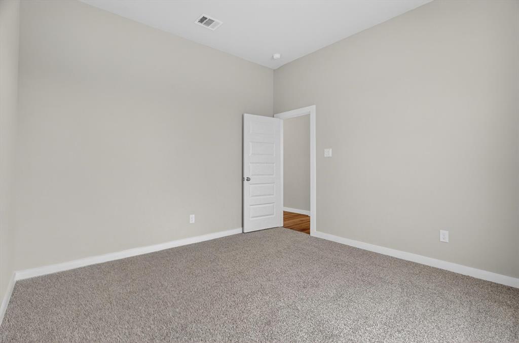 504 Clifton Court Springtown, TX 76082 - Photo 25 of 36 Room featuring light gray wall paint and clean white trim