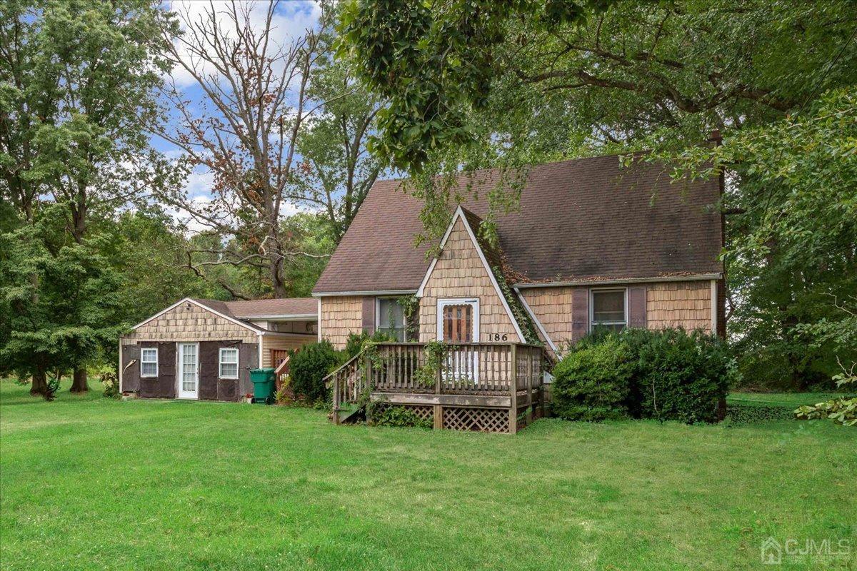 186 Cottrell Road Old Bridge, NJ 07747 - Photo 3 of 16 a view of a house with a yard