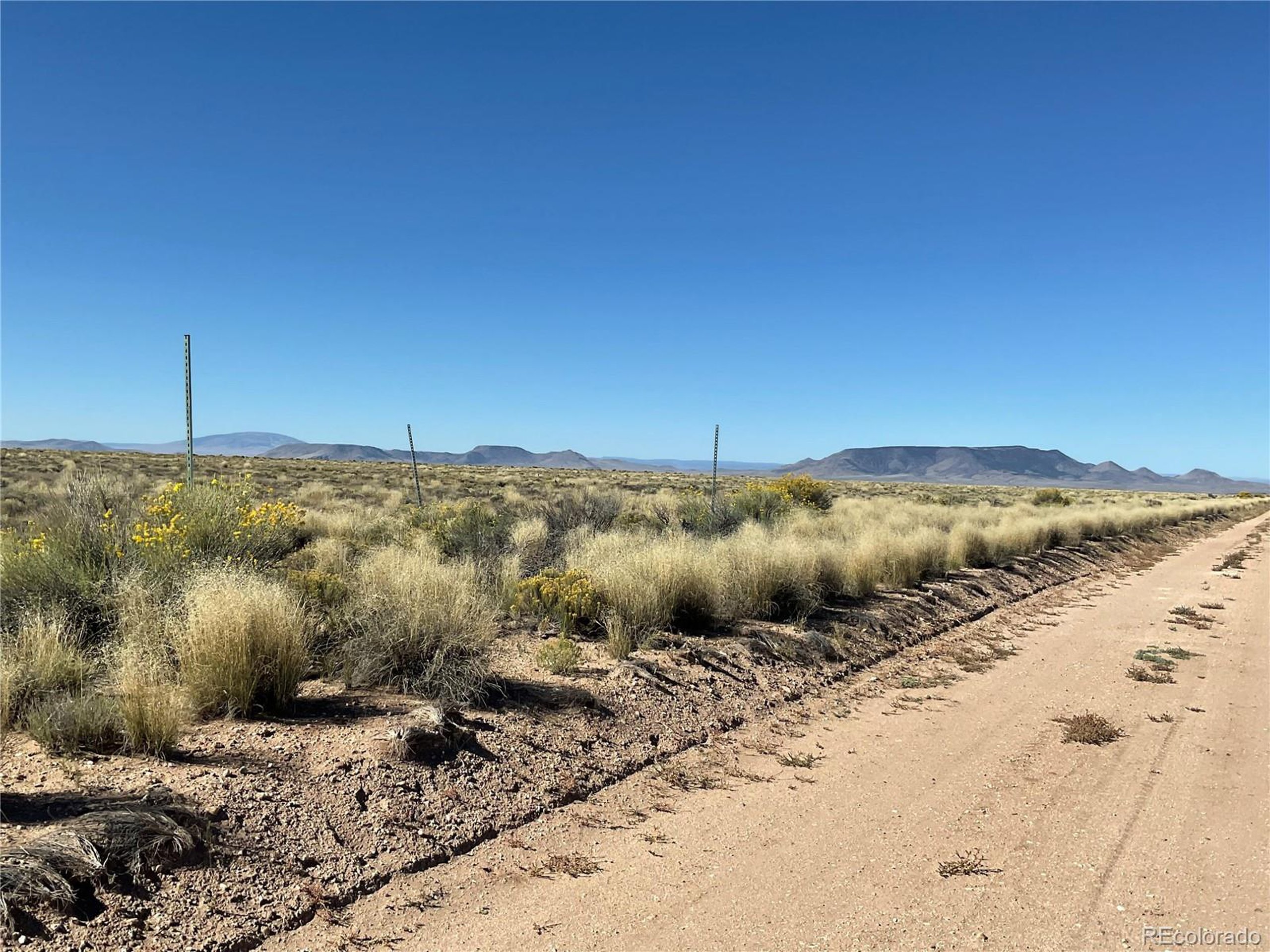 5 Jane Road Sanford, CO 81151 - Photo 3 of 12 a view of a road with an ocean view