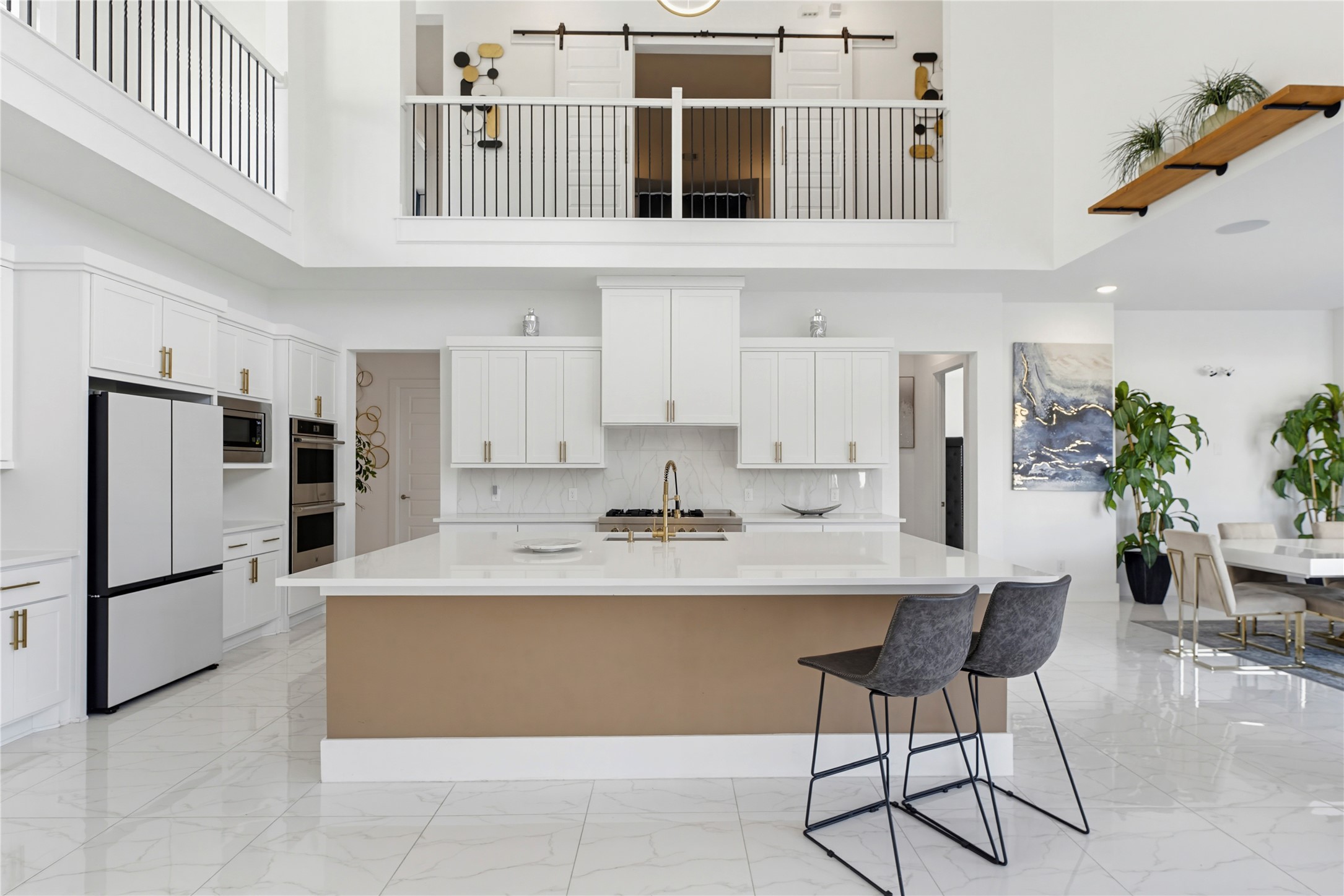 29526 Cir S Rnch Trail Fulshear, TX 77406 - Photo 11 of 48 a kitchen with stainless steel appliances granite countertop a refrigerator a sink a stove and white cabinets
