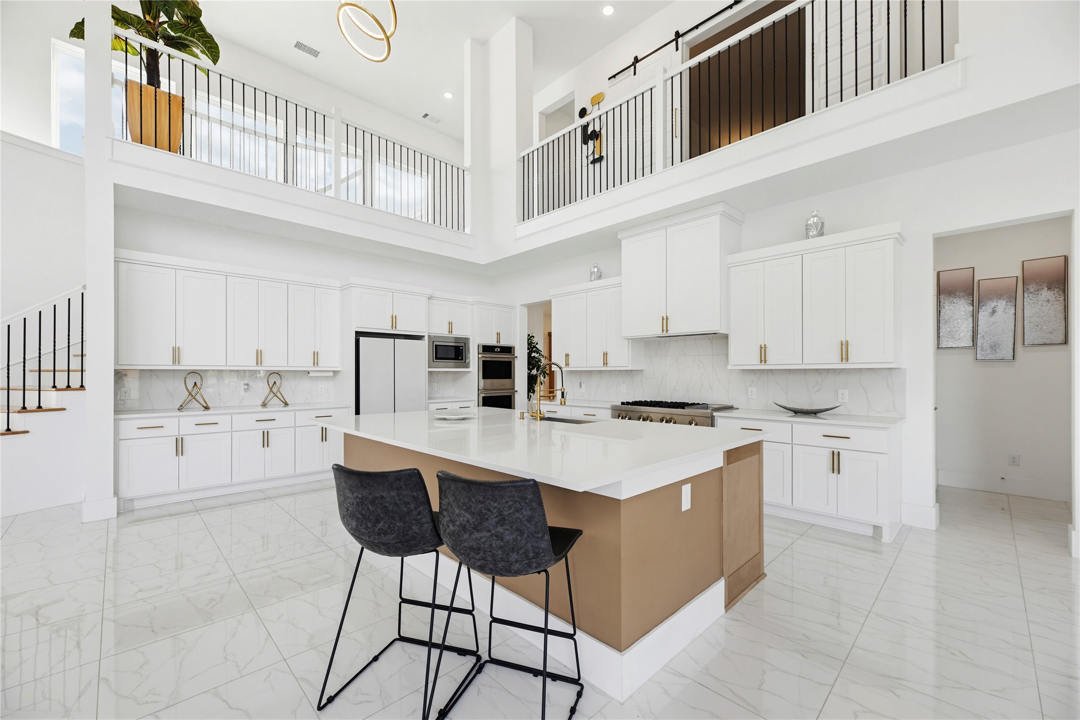 29526 Cir S Rnch Trail Fulshear, TX 77406 - Photo 12 of 48 a kitchen with stainless steel appliances a stove a sink and cabinets