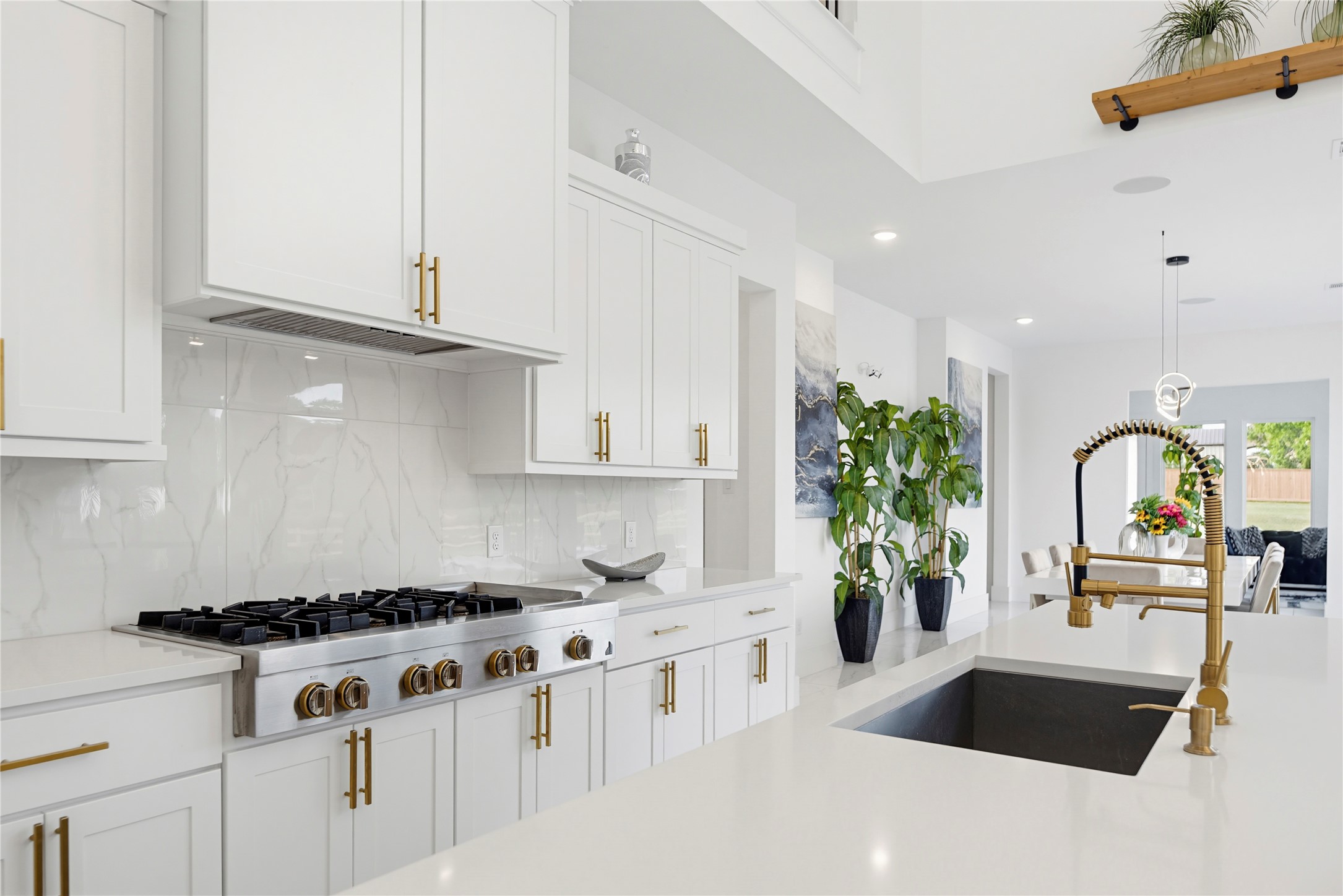 29526 Cir S Rnch Trail Fulshear, TX 77406 - Photo 13 of 48 a kitchen with stainless steel appliances granite countertop a sink a stove and a refrigerator