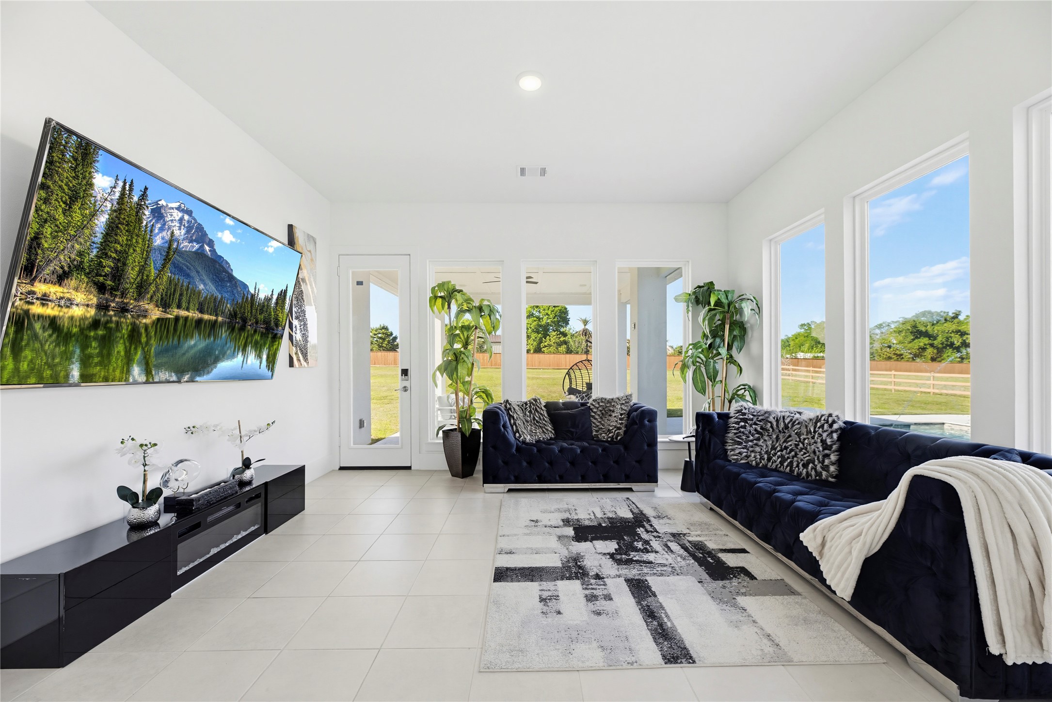 29526 Cir S Rnch Trail Fulshear, TX 77406 - Photo 17 of 48 a living room with furniture and a flat screen tv