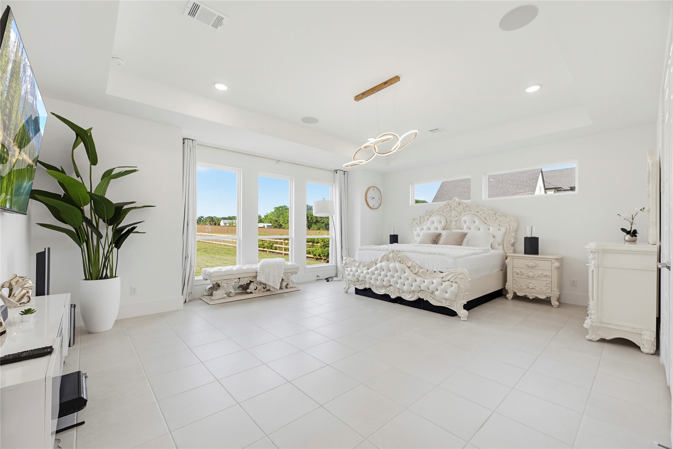 29526 Cir S Rnch Trail Fulshear, TX 77406 - Photo 19 of 48 a bedroom with furniture and a large window