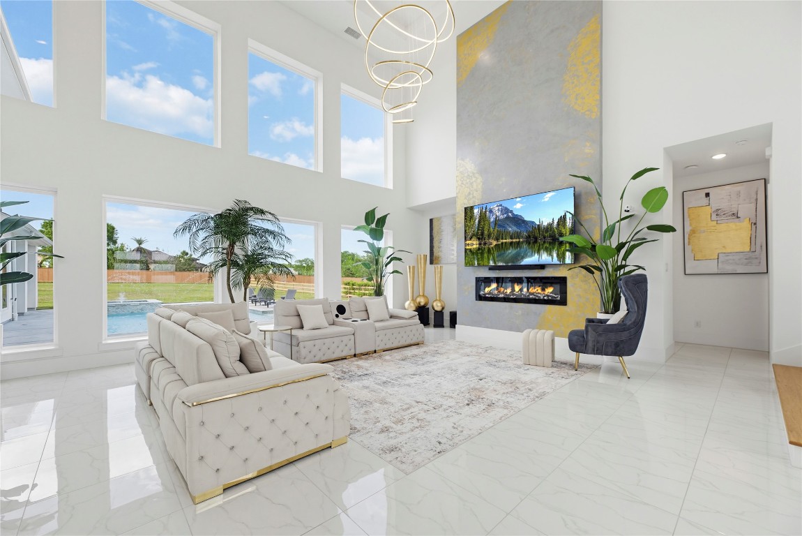 29526 Cir S Rnch Trail Fulshear, TX 77406 - Photo 2 of 48 a living room with furniture flowerpot and flower pot