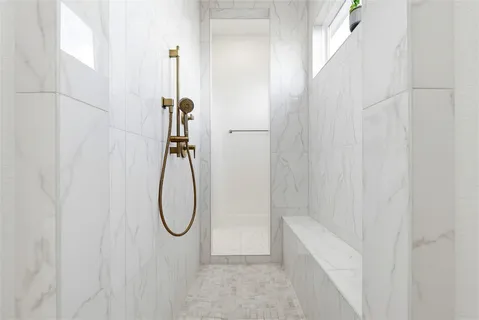 a living room with a closet and a window