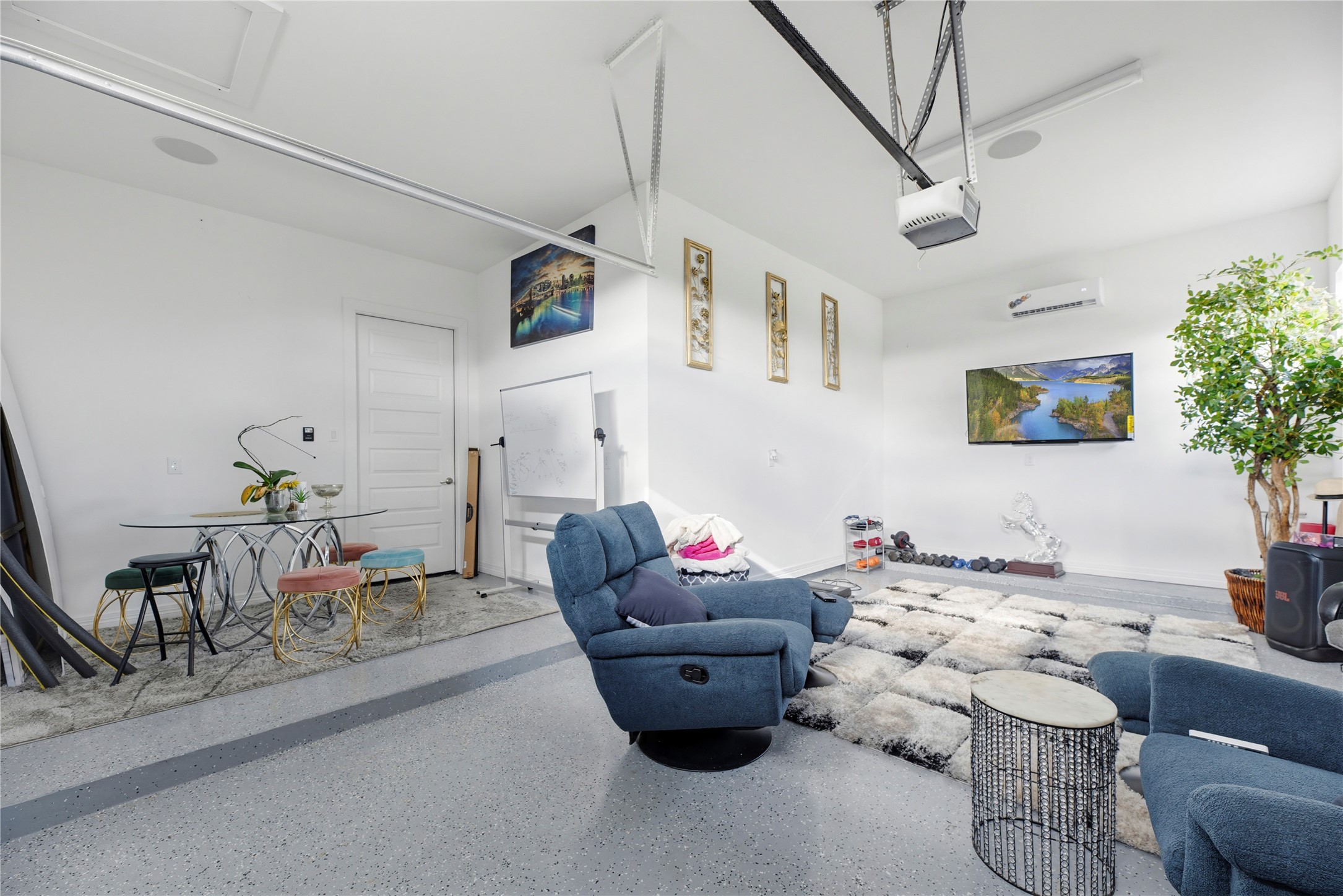 29526 Cir S Rnch Trail Fulshear, TX 77406 - Photo 31 of 48 a living room with furniture and a chandelier