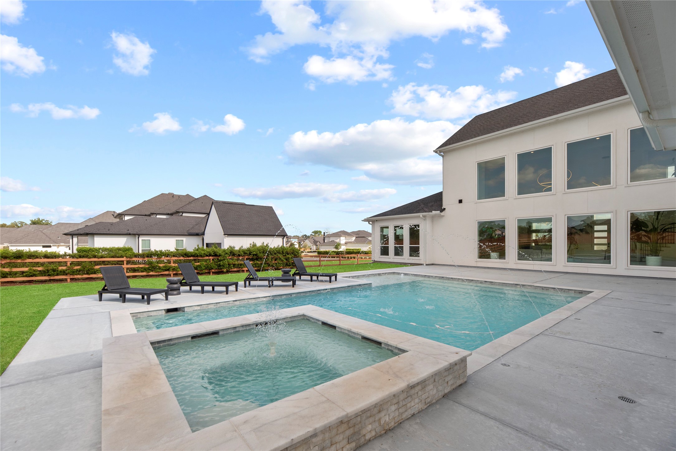 29526 Cir S Rnch Trail Fulshear, TX 77406 - Photo 33 of 48 a view of a house with swimming pool and sitting area