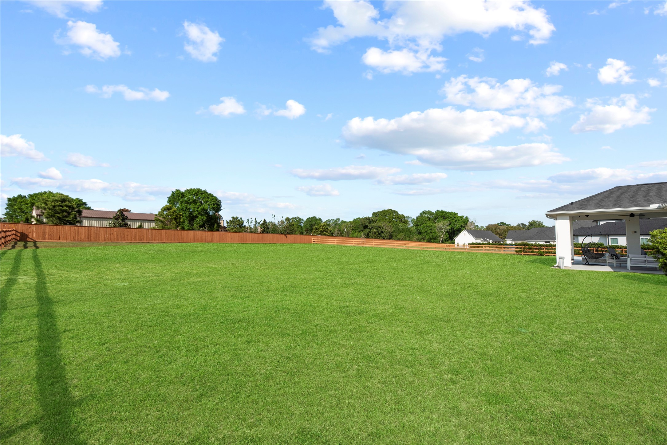 29526 Cir S Rnch Trail Fulshear, TX 77406 - Photo 36 of 48 a view of yard with swimming pool and green space