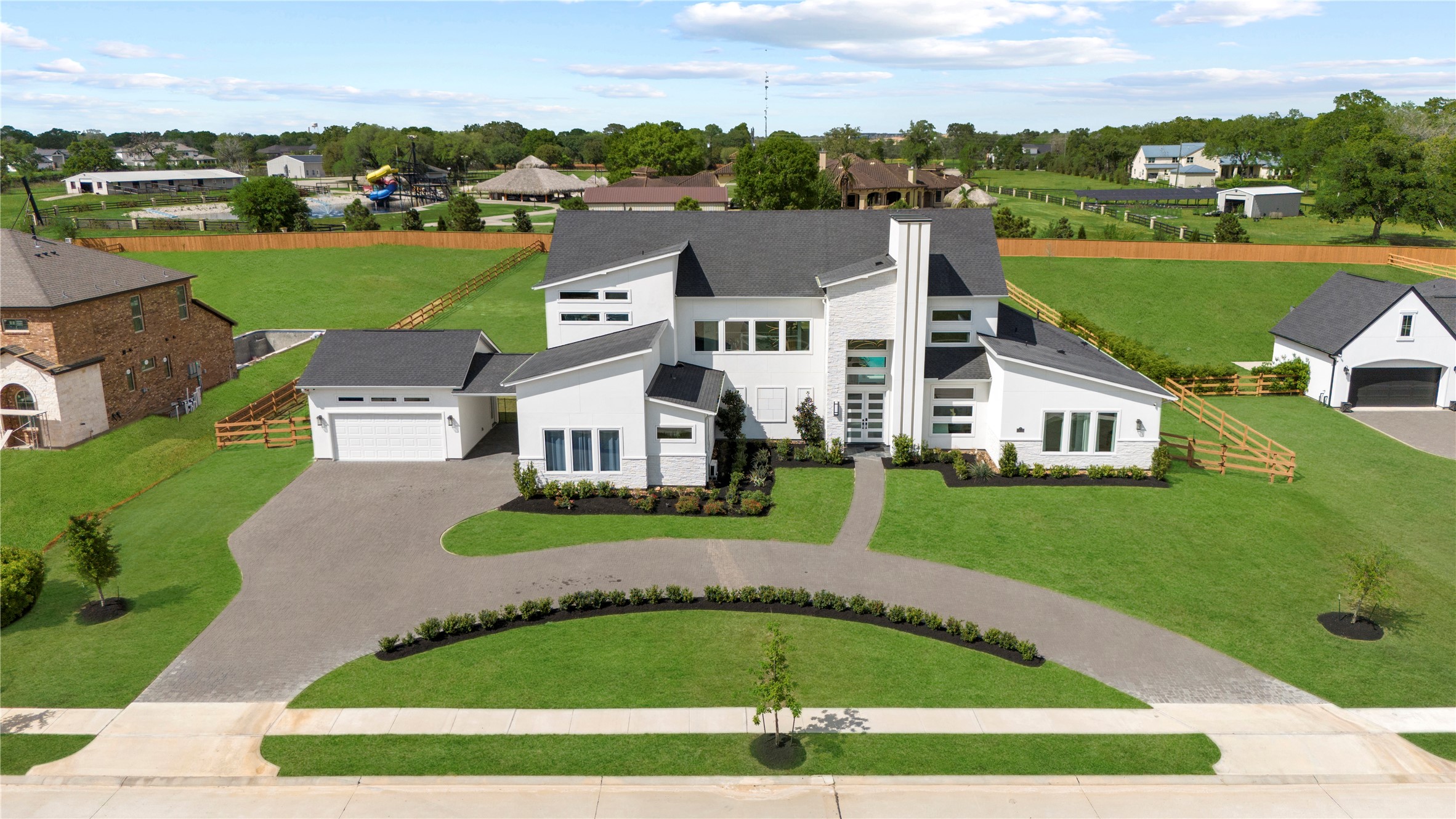 29526 Cir S Rnch Trail Fulshear, TX 77406 - Photo 38 of 48 an aerial view of a house with a garden