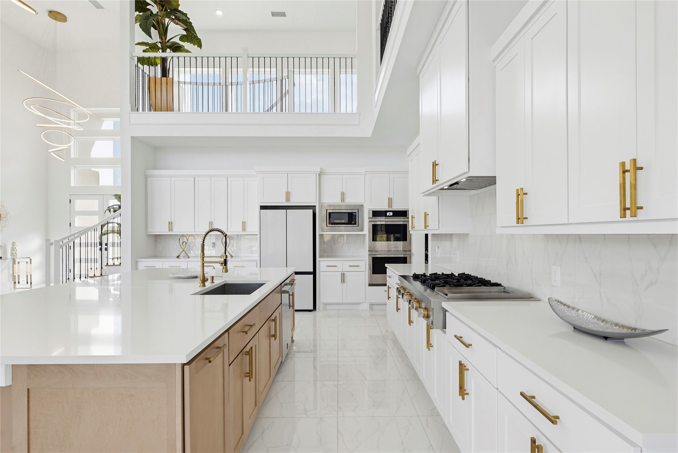 29526 Cir S Rnch Trail Fulshear, TX 77406 - Photo 4 of 48 a kitchen with stainless steel appliances a sink a stove and cabinets