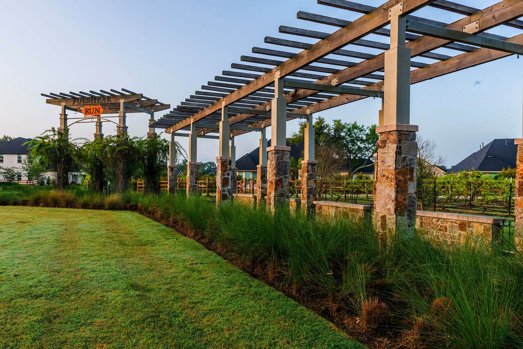 29526 Cir S Rnch Trail Fulshear, TX 77406 - Photo 42 of 48 a view of a patio with table and chairs potted plants and palm trees