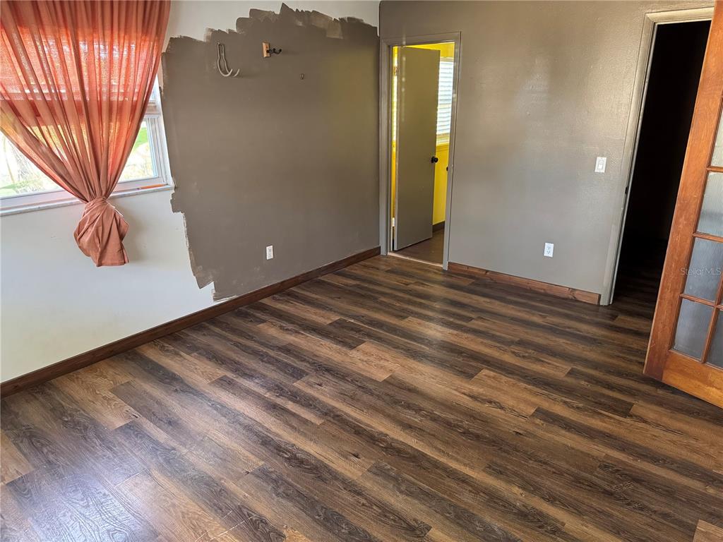 861 Palermo Road St. Augustine, FL 32086 - Photo 27 of 33 a view of a room with wooden floor and a sink