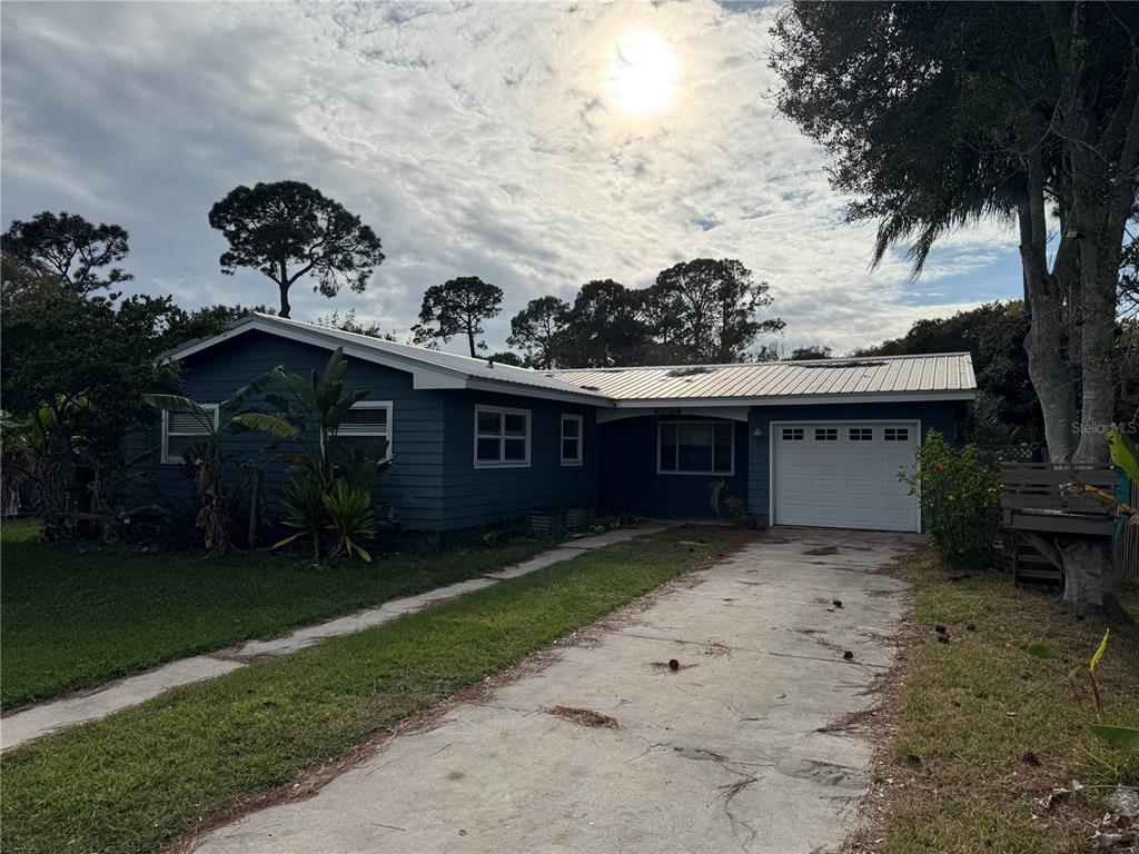 861 Palermo Road St. Augustine, FL 32086 - Photo 3 of 33 a view of house with backyard space and garden