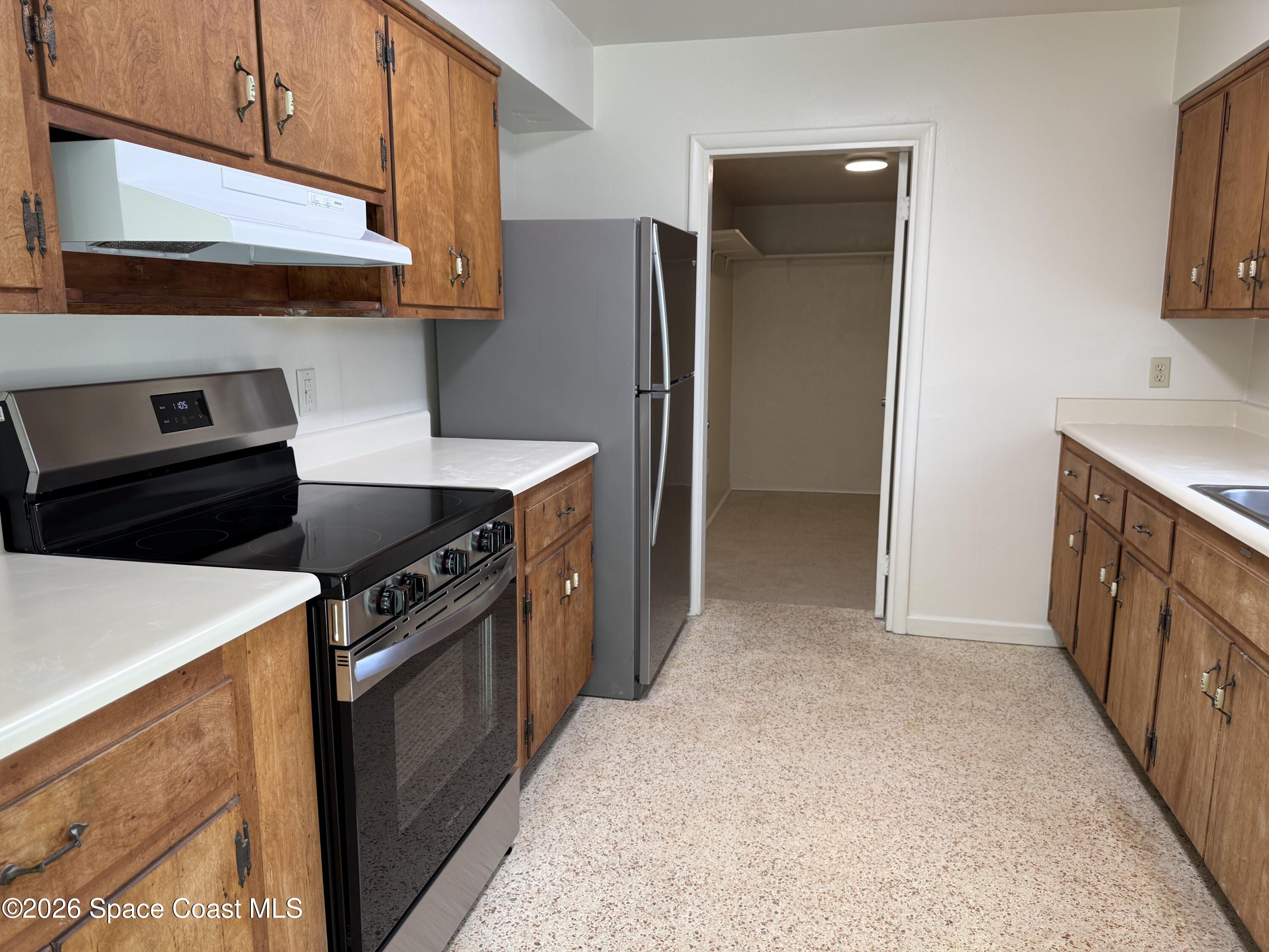 21 Rosevere Way Melbourne, FL 32901 - Photo 18 of 29 Open to Laundry Room
