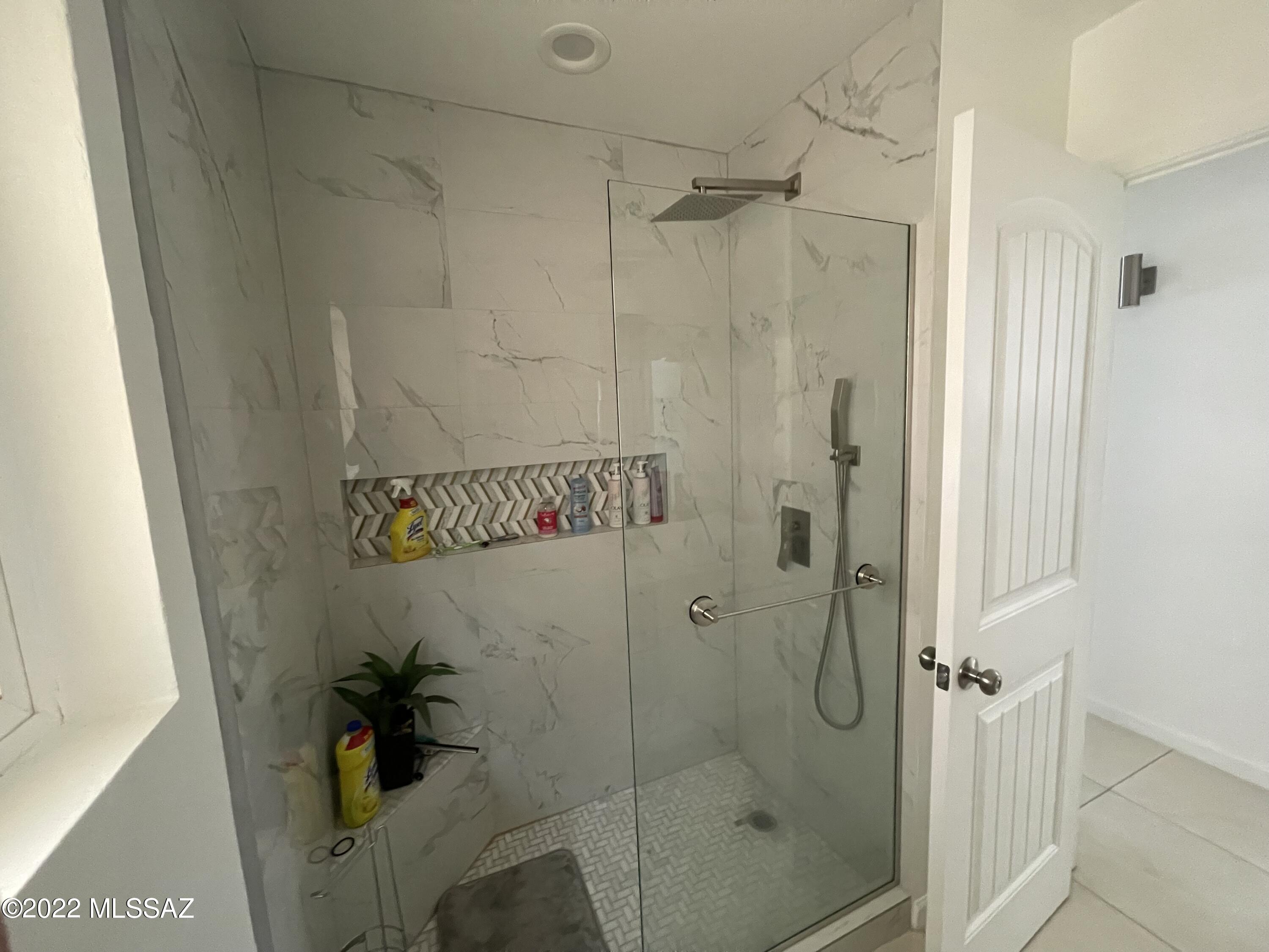 126 Avenida Ostion Rio Rico, AZ 85648 - Photo 24 of 31 a bathroom with a shower
