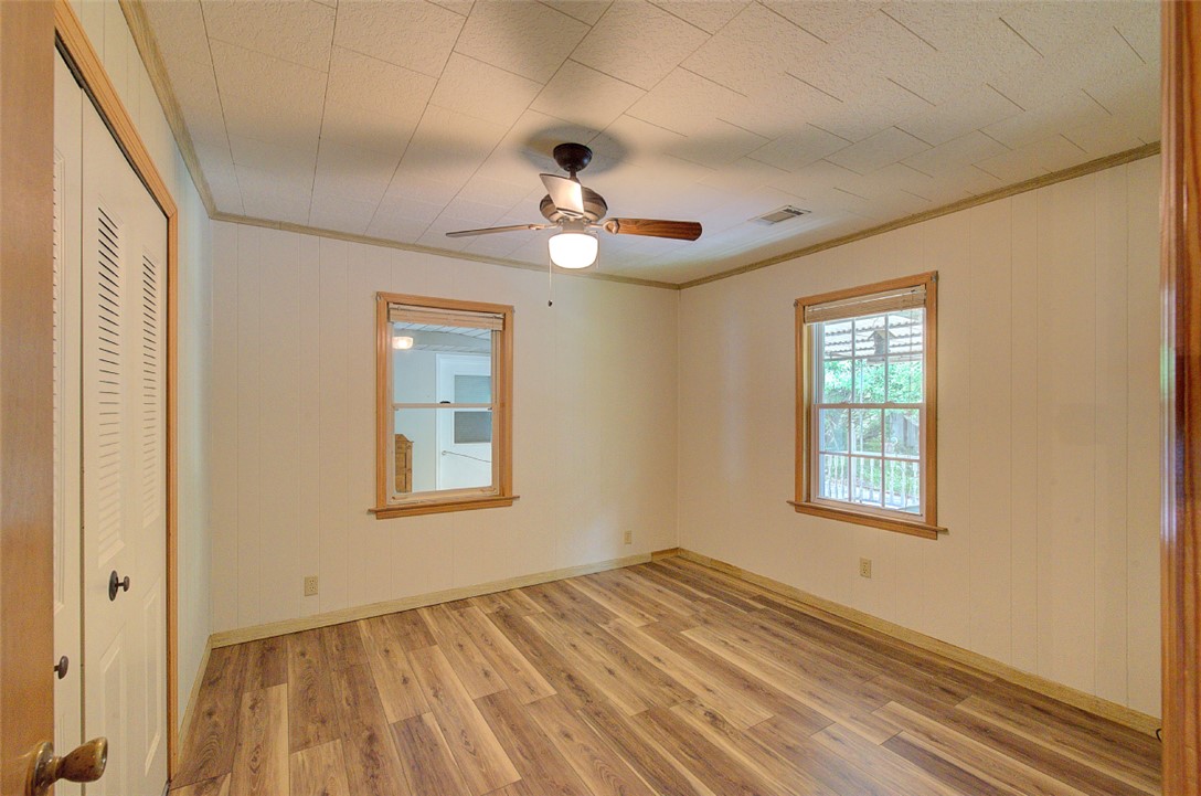 5064 Keowee School Road Seneca, SC 29672 - Photo 23 of 49 This inviting bedroom features rich hardwood flooring and abundant natural light.
