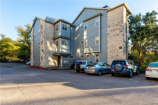 a car parked in front of a building