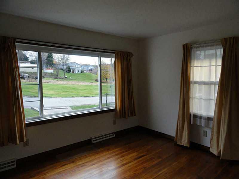 4015 Chieftan Road Irwin, PA 15642 - Photo 2 of 24 Living Room. The living room is 15 x11