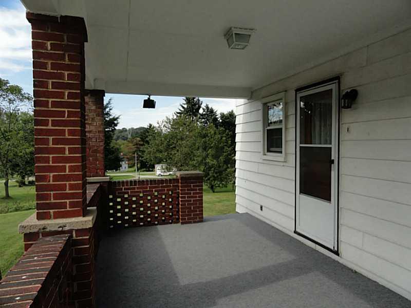 4015 Chieftan Road Irwin, PA 15642 - Photo 15 of 24 Patio/Deck. The side porch gives you access to the kitchen with wonderful views of the back yard.