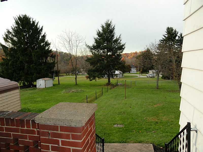 4015 Chieftan Road Irwin, PA 15642 - Photo 16 of 24 View. This is the view from the side porch looking toward the back yard.