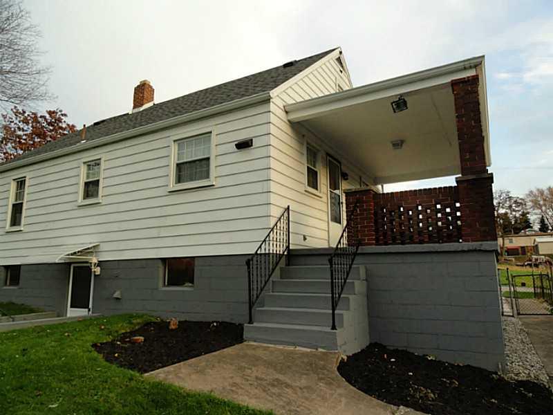 4015 Chieftan Road Irwin, PA 15642 - Photo 21 of 24 Exterior Back. Access to the back yard from the side porch.