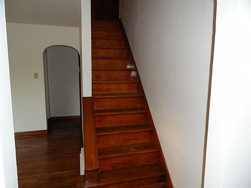 4015 Chieftan Road Irwin, PA 15642 - Photo 4 of 24 Entry/Foyer. The entry leads to the living room and stairs to the second floor.