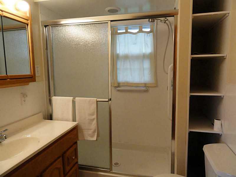 4015 Chieftan Road Irwin, PA 15642 - Photo 9 of 24 Full Bath. The first floor full bath has a spacious shower.