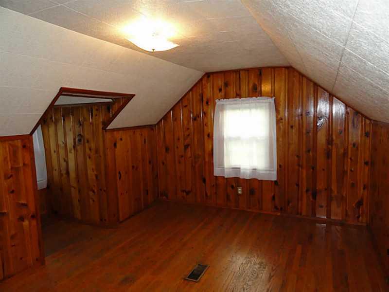 4015 Chieftan Road Irwin, PA 15642 - Photo 10 of 24 Bedroom. This second floor 13 x11 bedroom has beautiful knotty pine paneling and a cozy dormer nook.