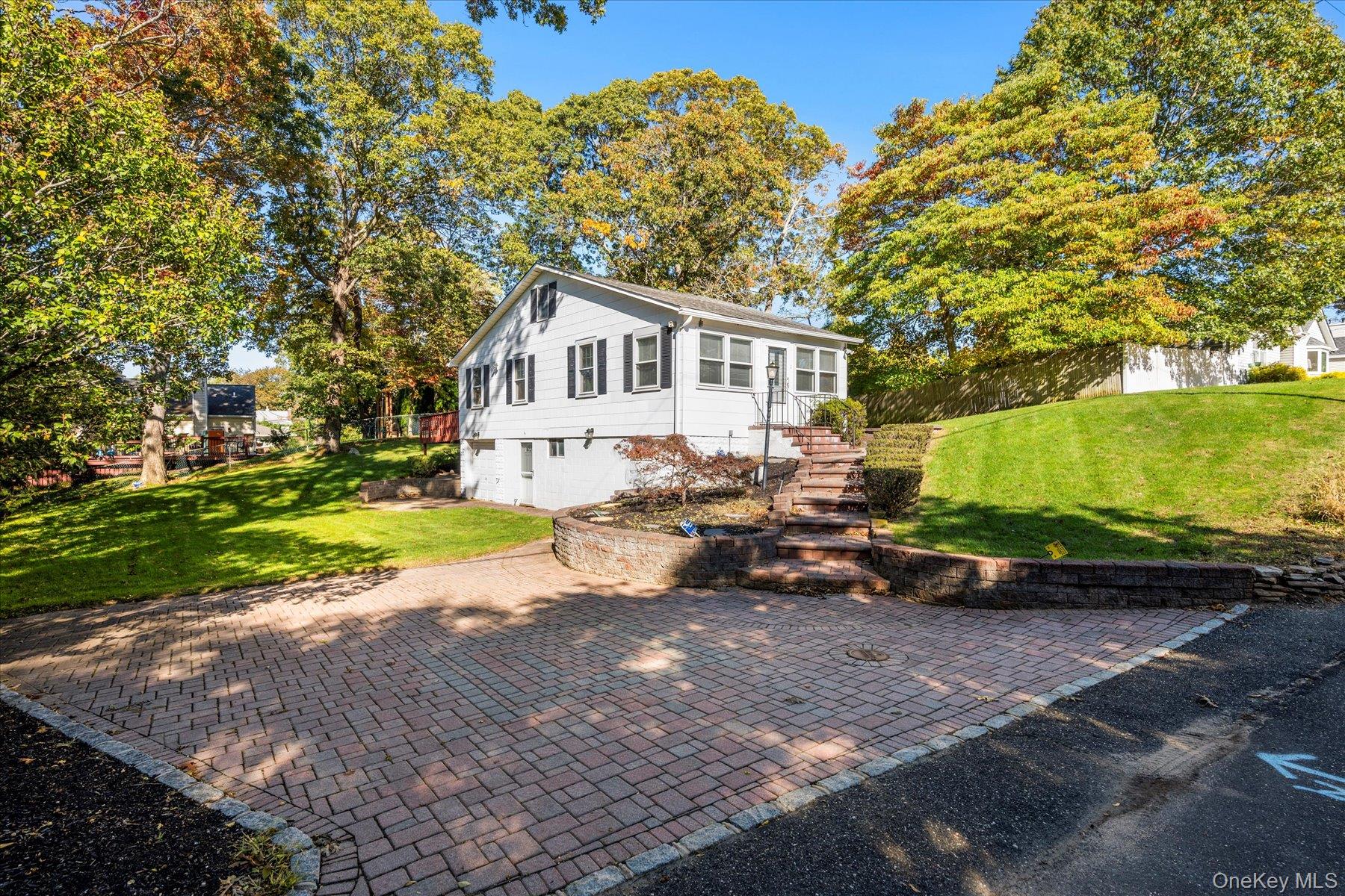 11 Naiad Road Rocky Point, NY 11778 - Photo 1 of 1 a view of a house with a yard
