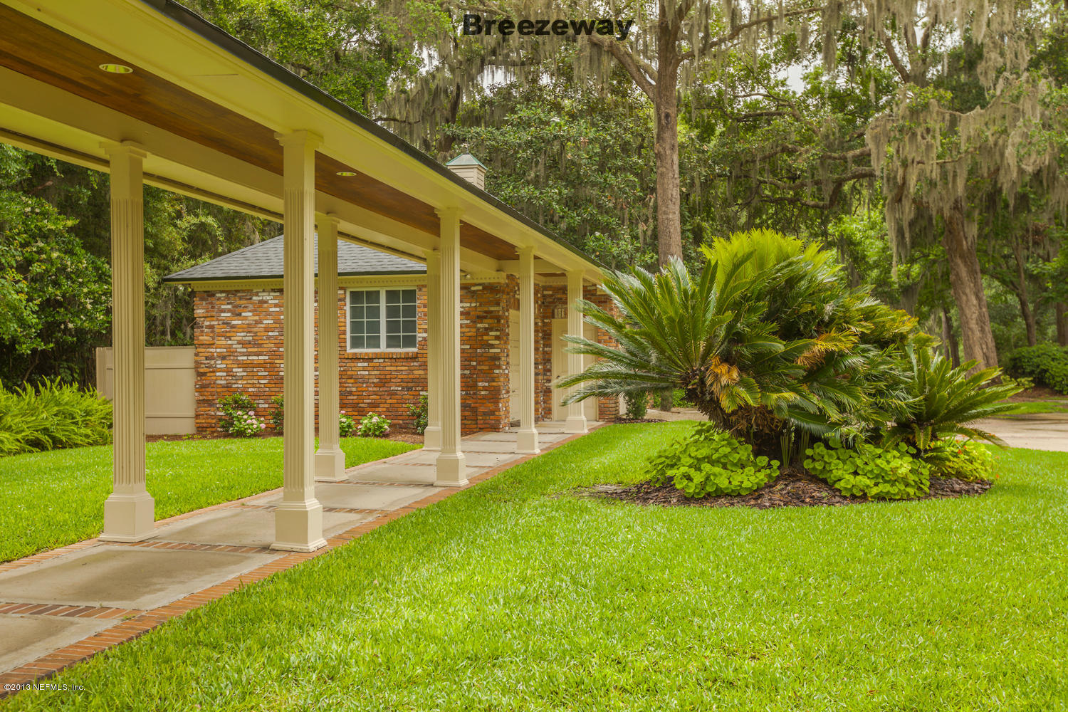 12584 Mandarin Road Jacksonville, FL 32223 - Photo 21 of 26 a view of a house with backyard and porch
