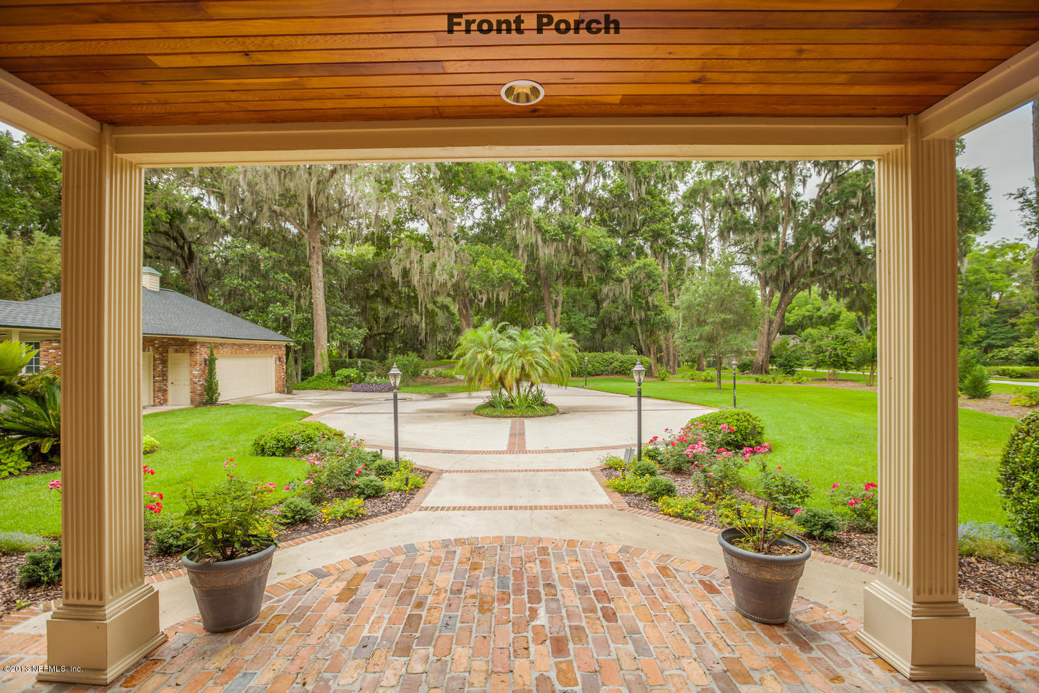 12584 Mandarin Road Jacksonville, FL 32223 - Photo 5 of 26 a view of a garden with plants and a potted plant