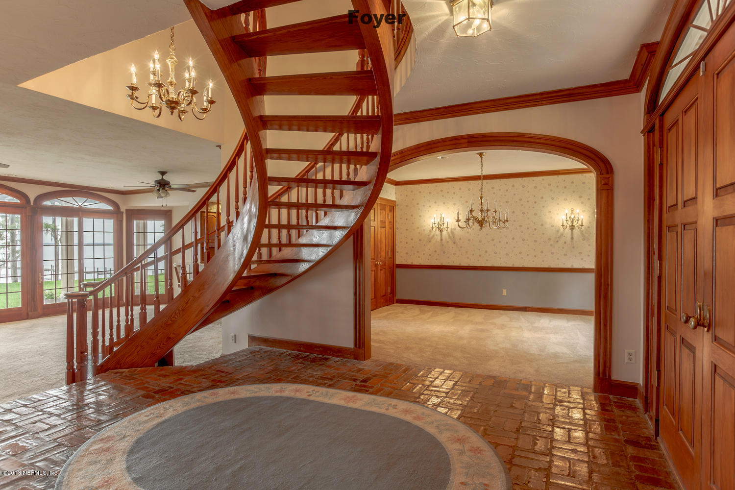 12584 Mandarin Road Jacksonville, FL 32223 - Photo 6 of 26 a view of entryway and hall with wooden floor