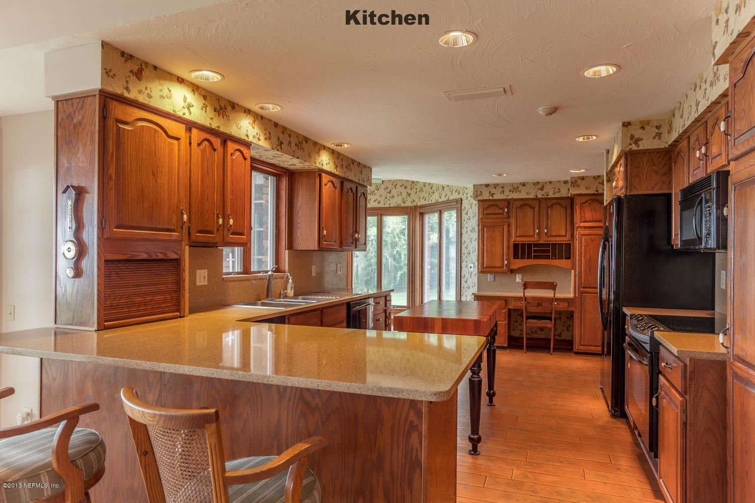 12584 Mandarin Road Jacksonville, FL 32223 - Photo 7 of 26 a very nice looking dining room with a large window