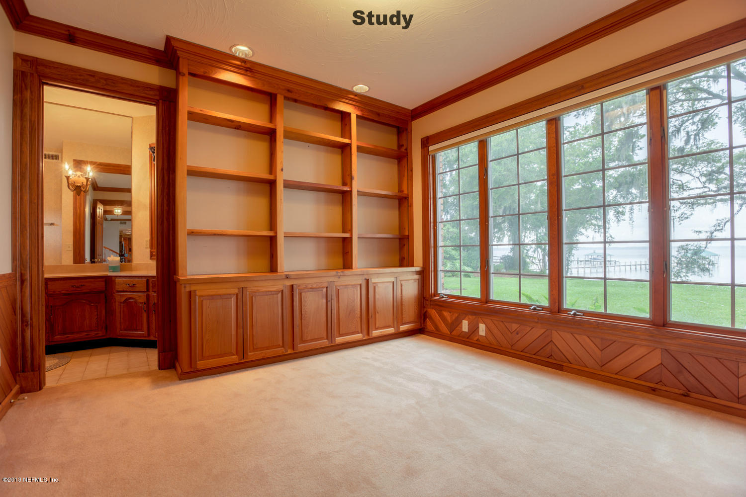 12584 Mandarin Road Jacksonville, FL 32223 - Photo 10 of 26 a view of an empty room with a window