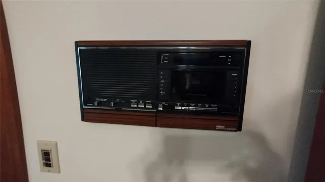 a view of staircase with white walls