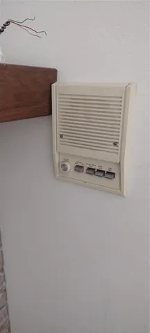 an empty room with a empty space and windows