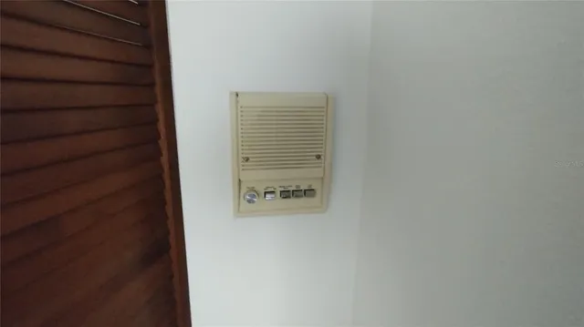 a kitchen with a sink cabinets and a refrigerator