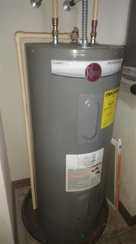 a stove top oven sitting inside of a kitchen