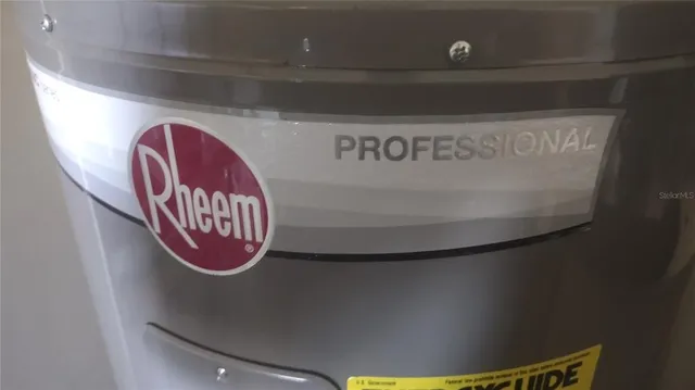 a stove top oven sitting inside of a kitchen
