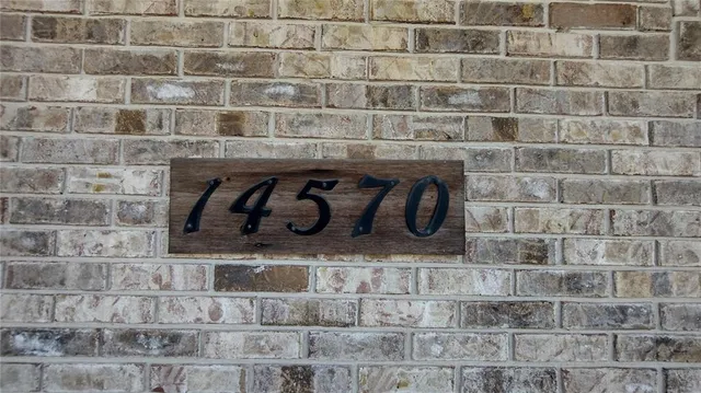a close view of a sink and a counter in a bathroom