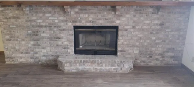 a brick oven with a fireplace