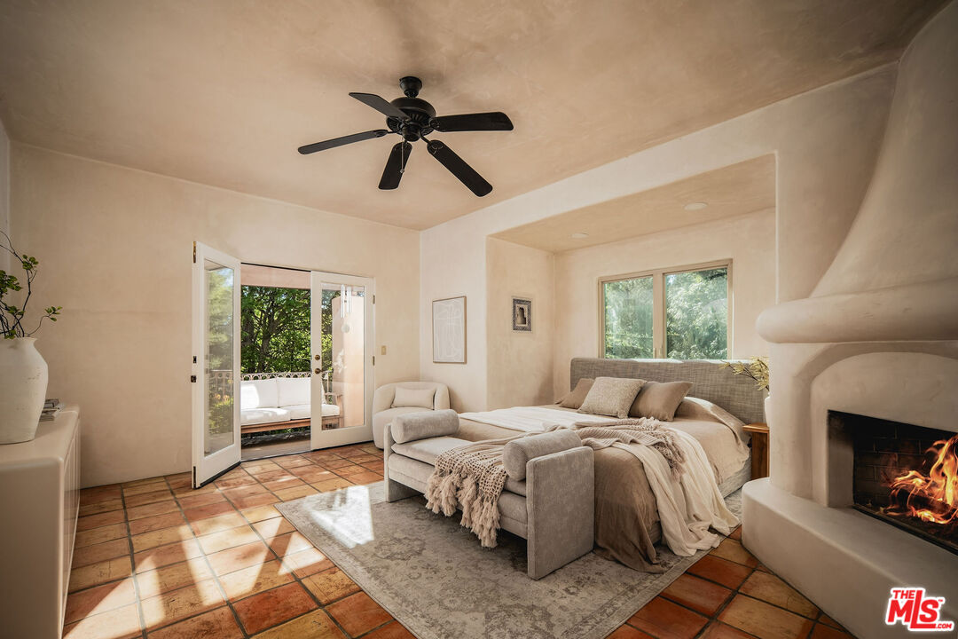 3450 Thacher Road Ojai, CA 93023 - Photo 11 of 33 a bedroom with a bed and a couch