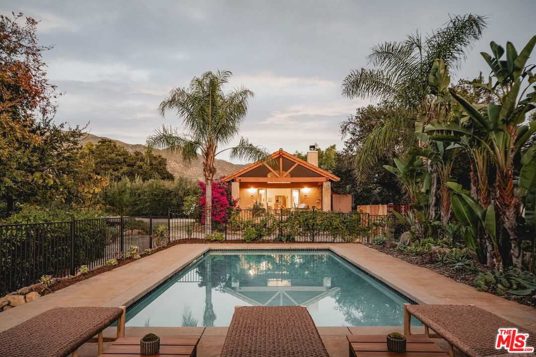 3450 Thacher Road Ojai, CA 93023 - Photo 19 of 33 a view of swimming pool with a lounge chairs