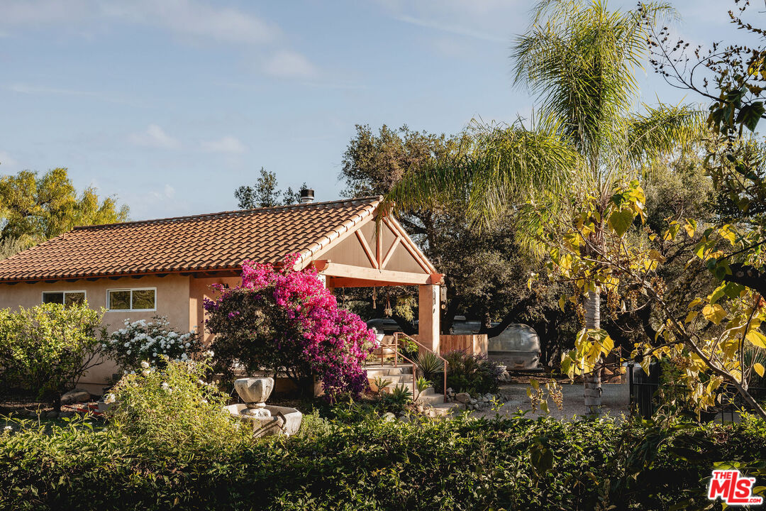 3450 Thacher Road Ojai, CA 93023 - Photo 20 of 33 a front view of a house with a garden