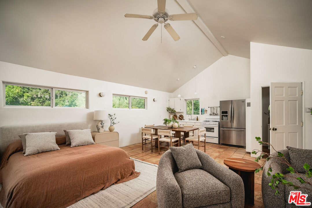 3450 Thacher Road Ojai, CA 93023 - Photo 21 of 33 a living room with furniture and a chandelier