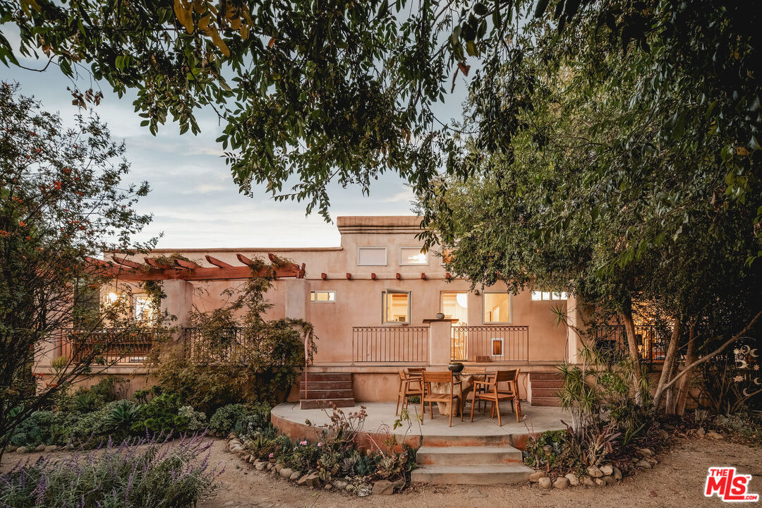 3450 Thacher Road Ojai, CA 93023 - Photo 26 of 33 a building with trees in front of it