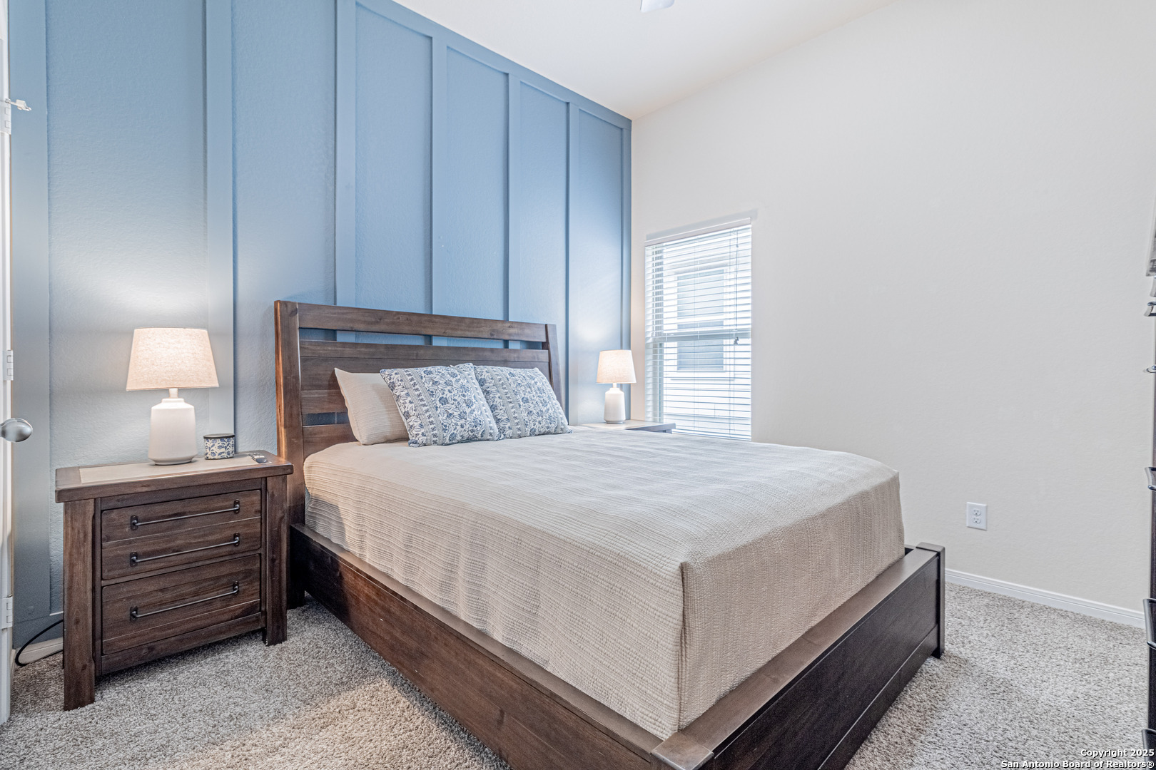 159 Brook View Cibolo, TX 78108 - Photo 17 of 24 a bedroom with a bed and a window